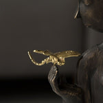 statue libellule dorée