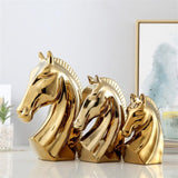 Trio sculptures cheval or